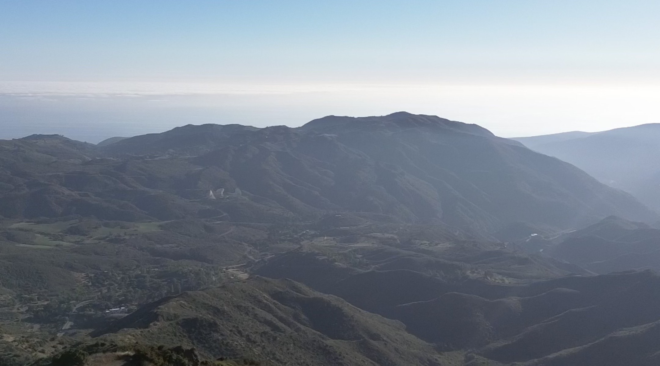 Wide mountain and ocean horizon